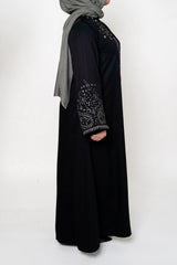 Black & White Embroidered Open Abaya featuring intricate black and white embroidery on a classic open design, offering a timeless and luxurious look. Perfect for both formal and casual outfits.