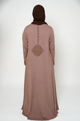 Back view of a brown abaya with intricate embroidery on the buttons, back, and sleeve ends, offering sophistication and exclusivity. A timeless piece perfect for both dinner parties and masjid visits, combining style and comfort.