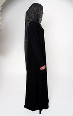 Geo Black Bamboo Modal Hijab in black featuring a modern geometric pattern in white, offering a sleek and stylish design that blends elegance with contemporary appeal.